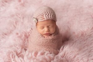 sleeping wrapped newborn baby Samphire photography horsham babies sitter sessions baby portraits Brighton sussex