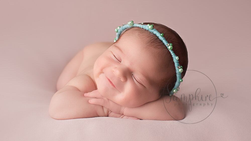 photographer Horsham sleeping smiling baby girl
