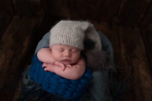 West Sussex Newborn Photographer baby boy in blue knits by Samphire Photography Horsham