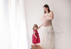 Bump to baby portraits sussex maternity sibling daughter twins and sibling Samphire Photography