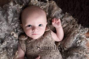 Professional Newborn Photographer Horsham awake boy brown knit Samphire Photography