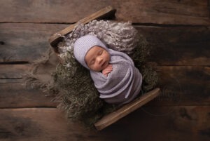 Portrait of sleeping baby girl by Professional Newborn Photographer Sussex