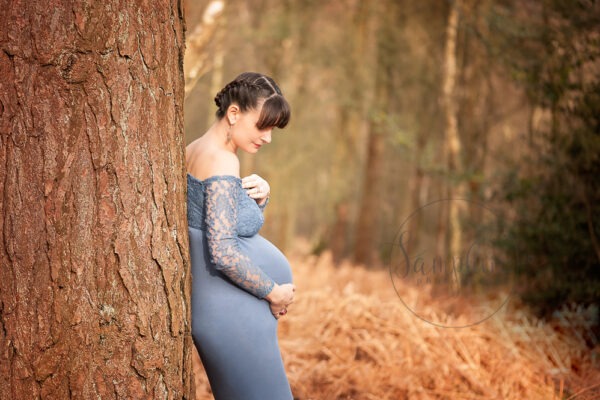 Woodland Maternity and Newborn Session pregant lady blue dress outdoors tree Samphire Photography