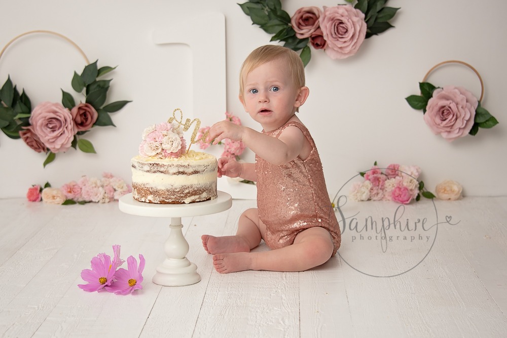 floral cake smash with little girl