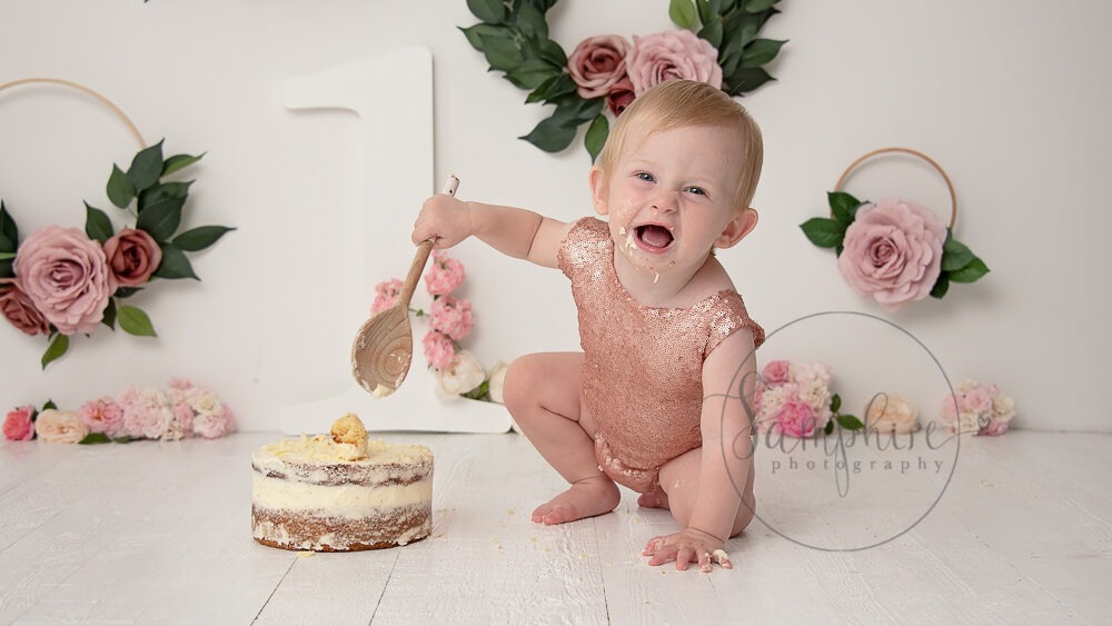 Baby's first year cake smash portraits pink floral Samphire Photography Sussex