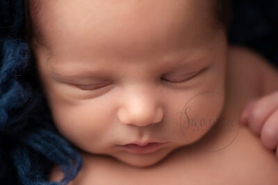 baby boy asleep blue flokati Newborn Photography West Sussex Samphire Photography