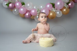 Beautiful Balloon Cake Smash pink grey gold Samphire Photography Sussex