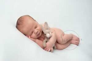 Woodland Maternity and Newborn Session studio portrait baby boy sleeping felted bunny Samphire Photography