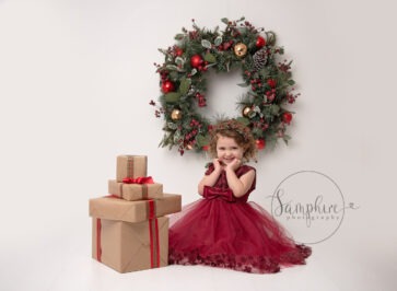 Christmas Portraits Sussex girl classy christmas colour wreath presents west sussex