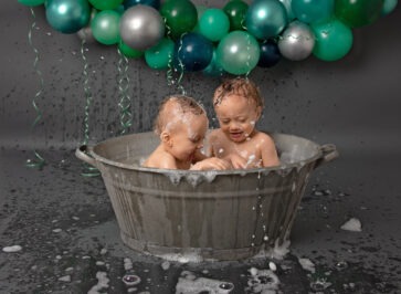 Experienced Portrait Photographer Sussex samphire photography happy twins green grey cake smash splash 2019