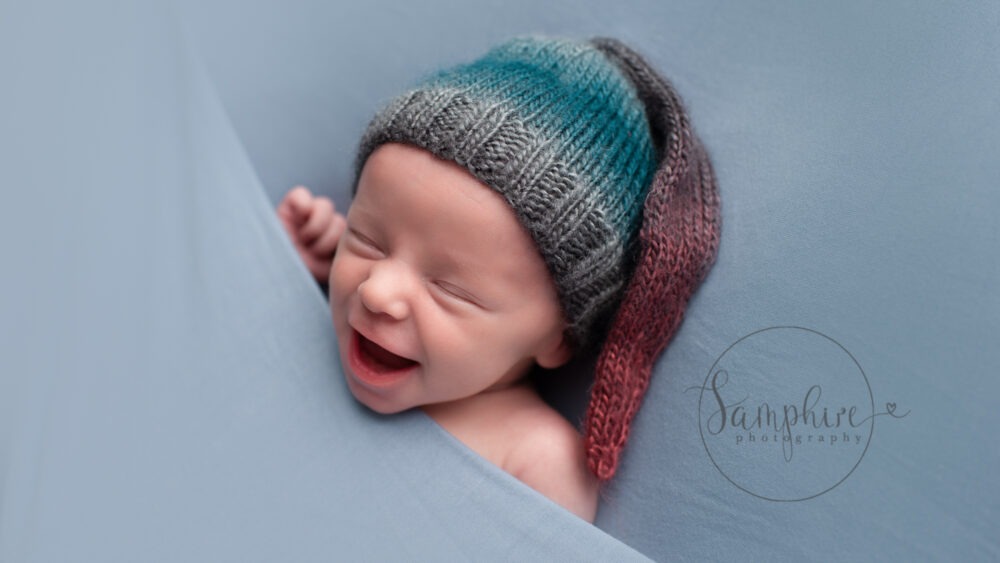 baby photo shoots Newborn baby photography smiling boy knitted hat