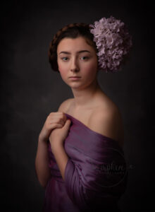fine art style photo portrait of teen girl with floral headpiece