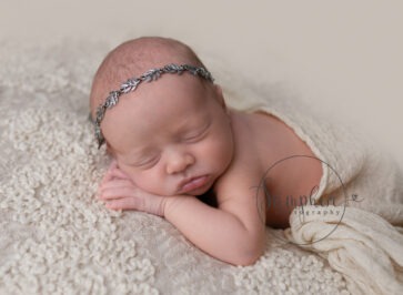 sleeping baby girl with headband