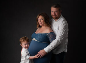 maternity photoshoot expectant mum with partner and child