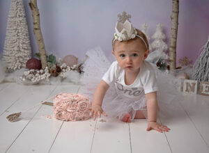 girl with first birthday crown