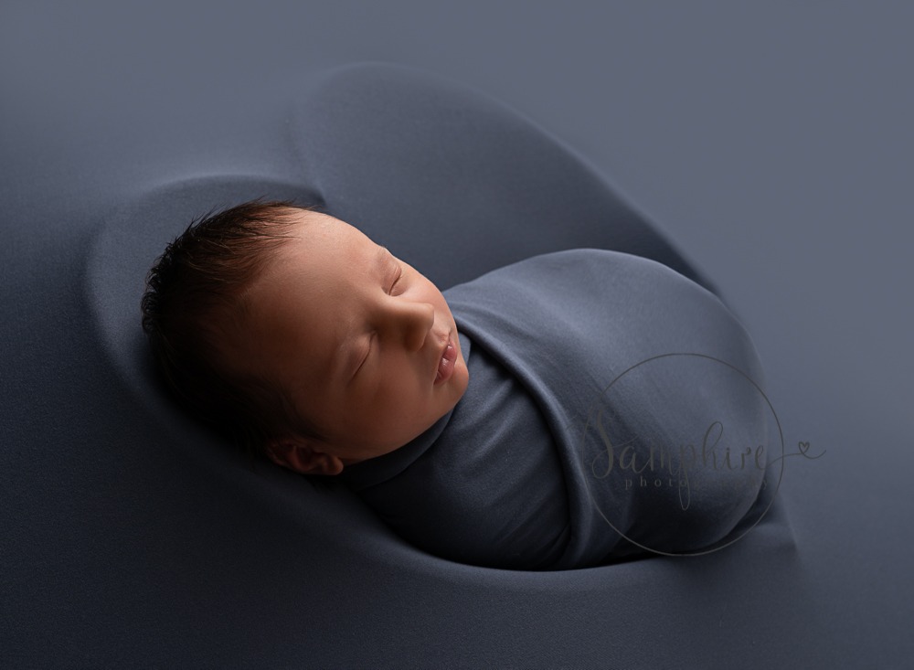Newborn Photographer West Sussex Samphire Photography Baby in blue heart bowl