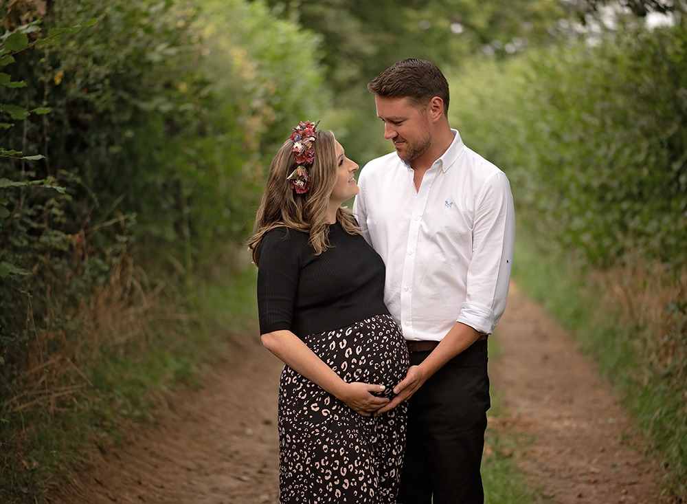 outdoor pregnancy portrait with partner