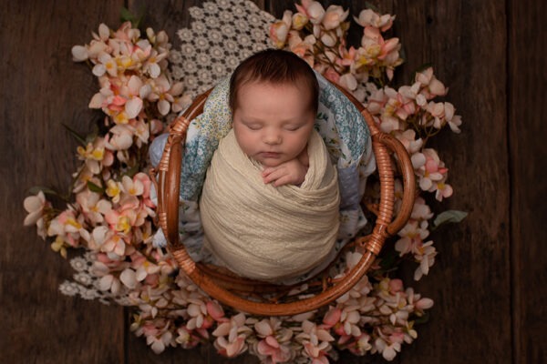 Behind the Scenes of a Newborn photoshoot Horsham at Samphire Photography showing girl in basket