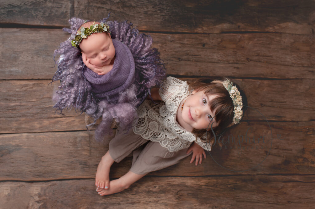 Studio photograph of two young sisters